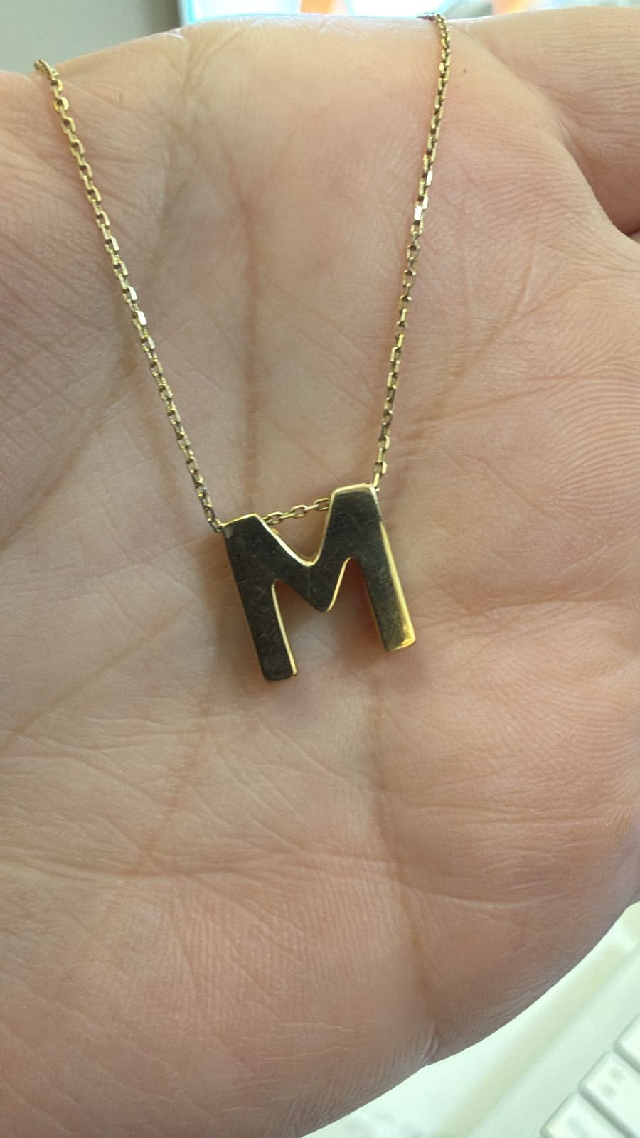CADENA LETRA M 14K 2.6GR